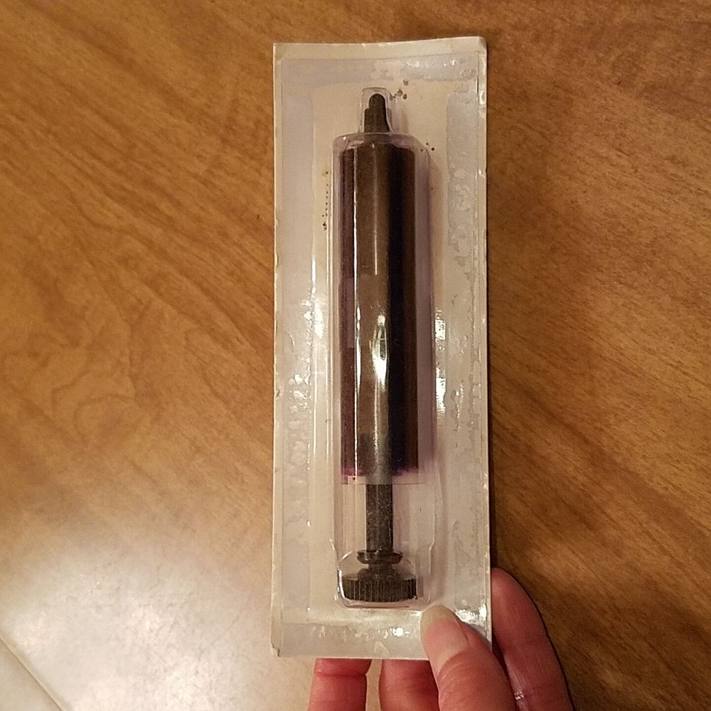 New in package.  Cash register purple ink roller.